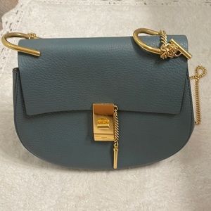 CHLOÉ
Drew Medium Grain Lambskin Shoulder Bag in Blue